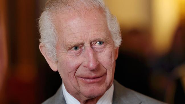 Britain's King Charles III reacts during a ceremony for the Prince's Trust Award 2024 winners and celebrity ambassadors, at Buckingham Palace, in London, on May 22, 2024. (Photo by Chris Jackson / POOL / AFP)