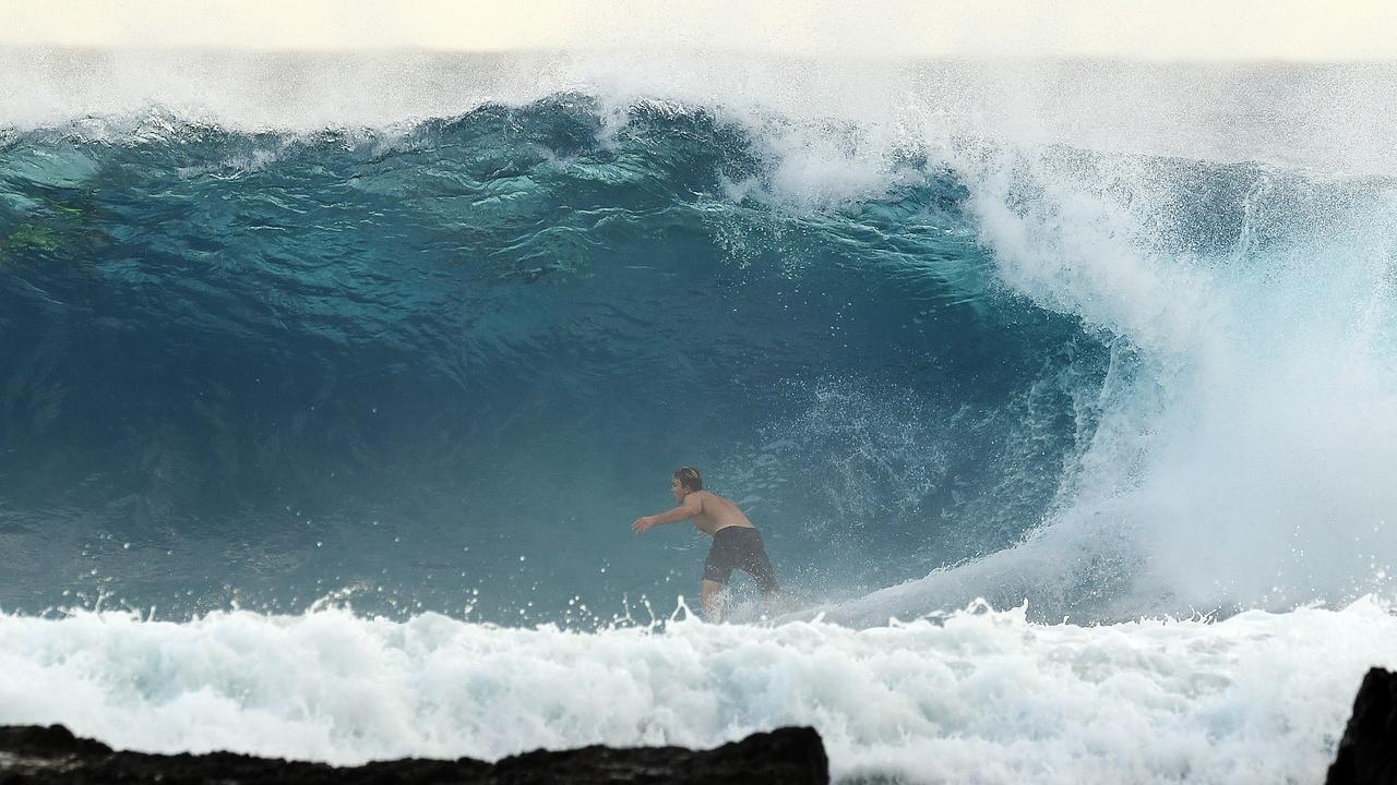 Surf's up: Cyclone brings big waves to Coast