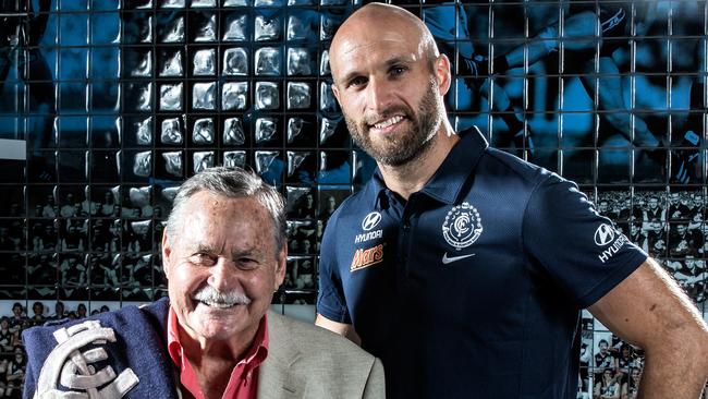 Ron Barassi and Chris Judd in 2015, marking 50 years since Barassi made the shock move to change clubs. Picture: Mark Dadswell