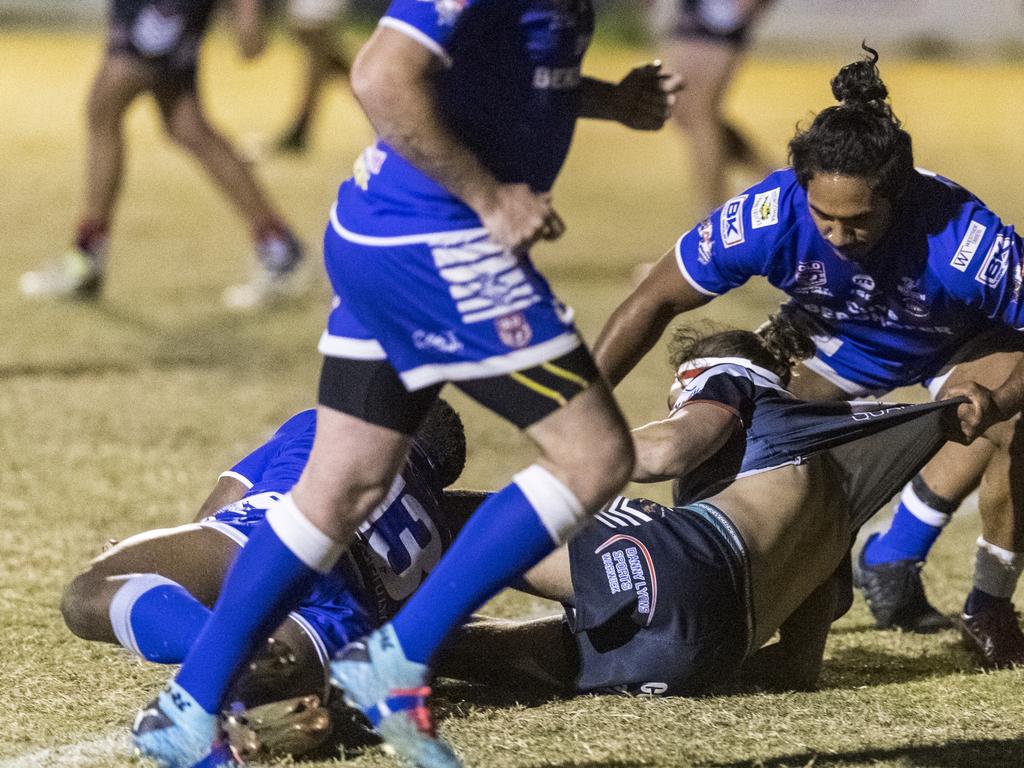 Denzel Briscoe (left) tackles for Newtown against Warwick in TRL A grade round 10 rugby league at Jack Martin Centre, Saturday, June 19, 2021. Picture: Kevin Farmer