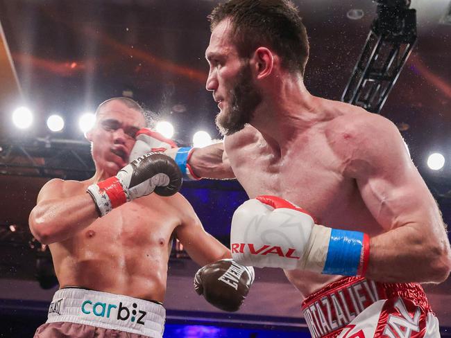 ORLANDO, FLORIDA - OCTOBER 19: Bakhram Murtazaliev punches Tim Tszyu at Caribe Royale Orlando on October 19, 2024 in Orlando, Florida.   Alex Menendez/Getty Images/AFP (Photo by Alex Menendez / GETTY IMAGES NORTH AMERICA / Getty Images via AFP)