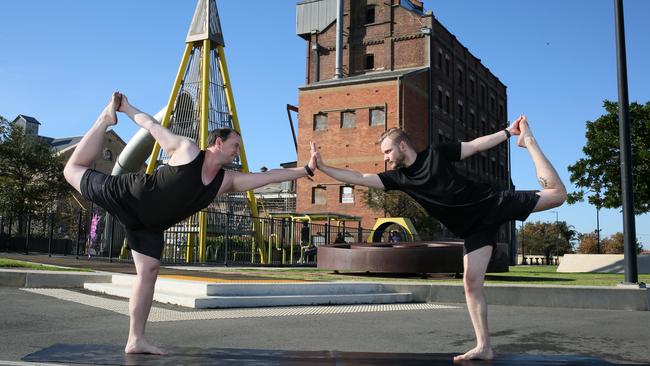 Jay Gardam and Alex Dakiniewicz will be among those leading the first ever Port Adelaide Yoga Festival. Picture: AAP/Emma Brasier