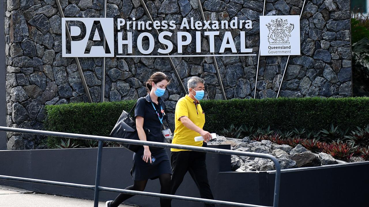 A nurse (left) is seen leaving the Princess Alexandra Hospital in Brisbane. Picture: NCA NewsWire/Dan Peled