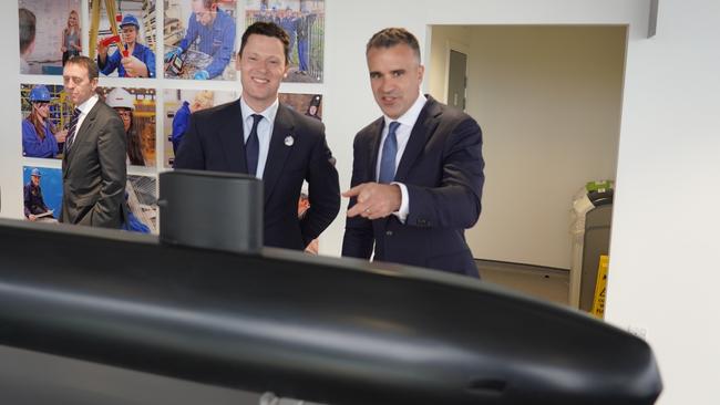 Premier Peter Malinauskas and UK Defence Procurement Minister Alex Chalk at the Barrow-in-Furness nuclear submarine shipyard operated by BAE Systems.