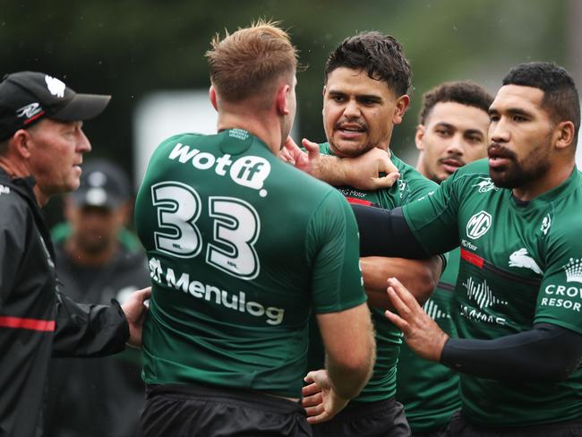 SYDNEY, AUSTRALIA - MARCH 08: Latrell Mitchell wrestles with Jacob Host during a South Sydney Rabbitohs NRL Training Session at Redfern Oval on March 08, 2022 in Sydney, Australia. (Photo by Matt King/Getty Images)