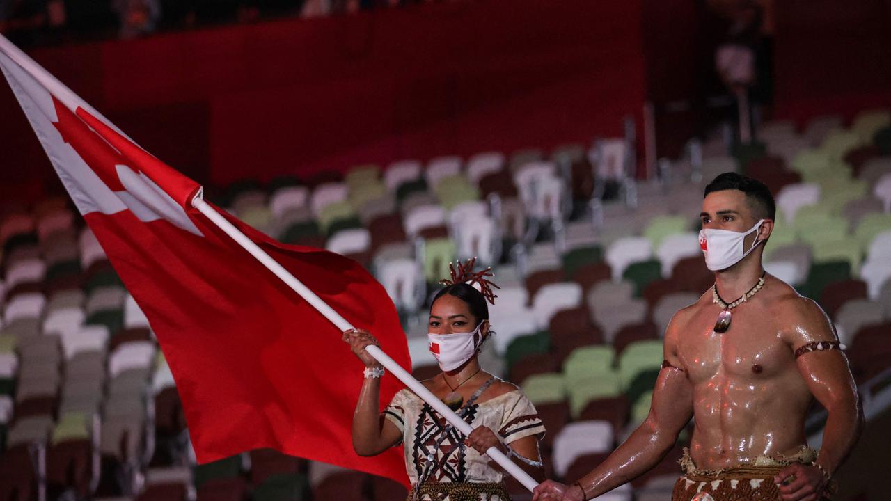 Tonga's flag bearers Malia Paseka (L) and Pita Taufatofua were one of the highlights of the Opening Ceremony.