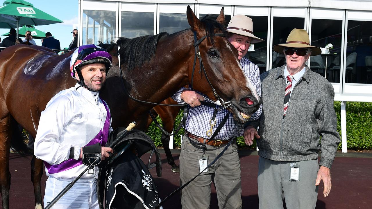 Go Wandji and Larry Cassidy with owner John Dougall (far right) and trainer Tom Dougall (second from right). Picture: Grant Peters-Trackside Photography