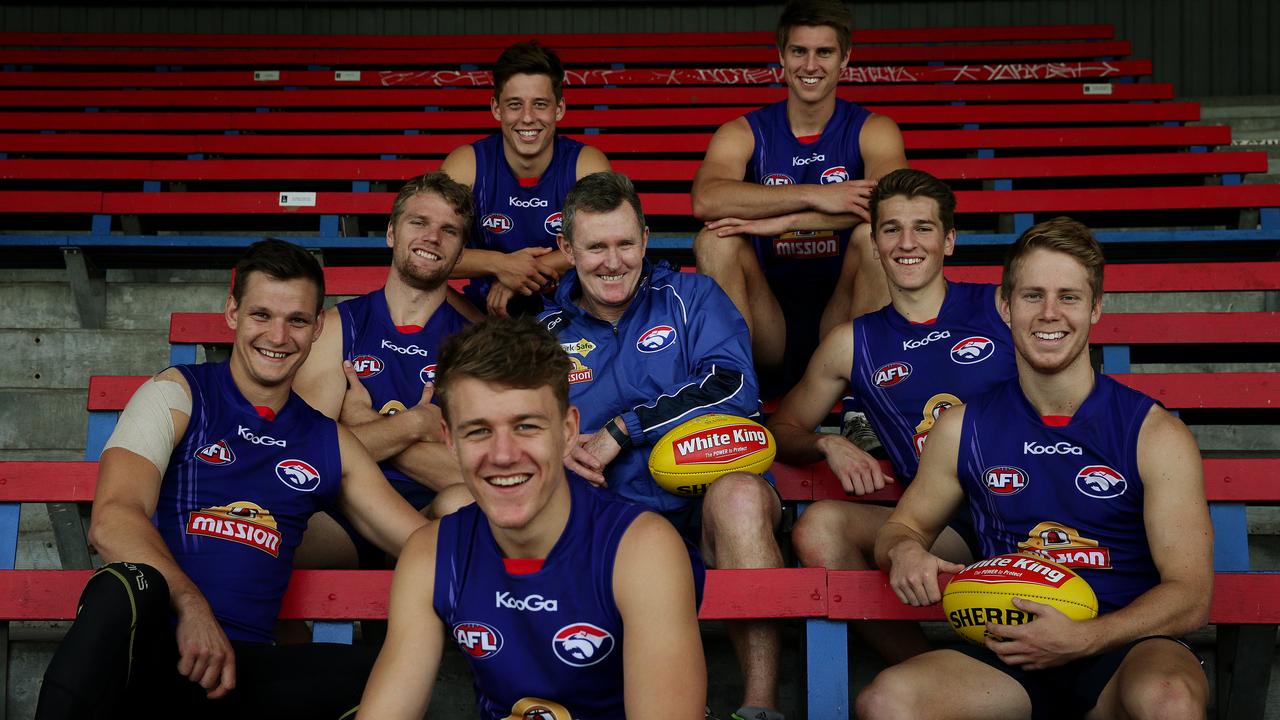 Brendan McCartney with the young Bulldogs he helped develop. Picture: Colleen Petch