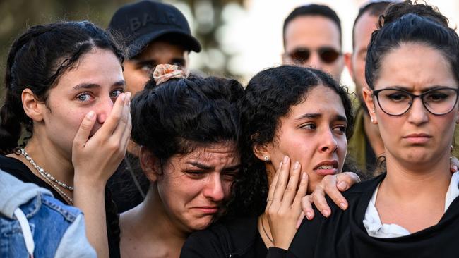 Mourners weep for Israeli doctor Daniel Levi Ludmir killed while treating the wounded during Hamas attacks. Picture: Getty Images