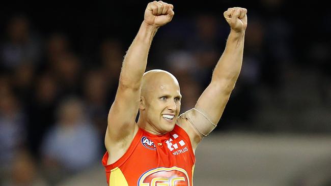 Gary Ablett celebrates a Gold Coast goal.