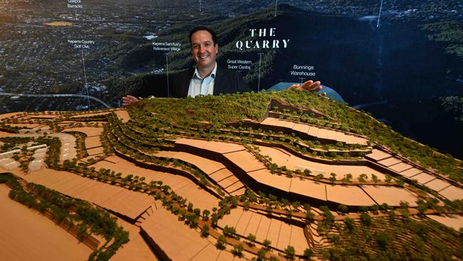 Nick Kostellar, Development Director of Frasers Property Australia, with a model of the land lots and stages across The Quarry. Picture: Lyndon Mechielsen/Courier Mail