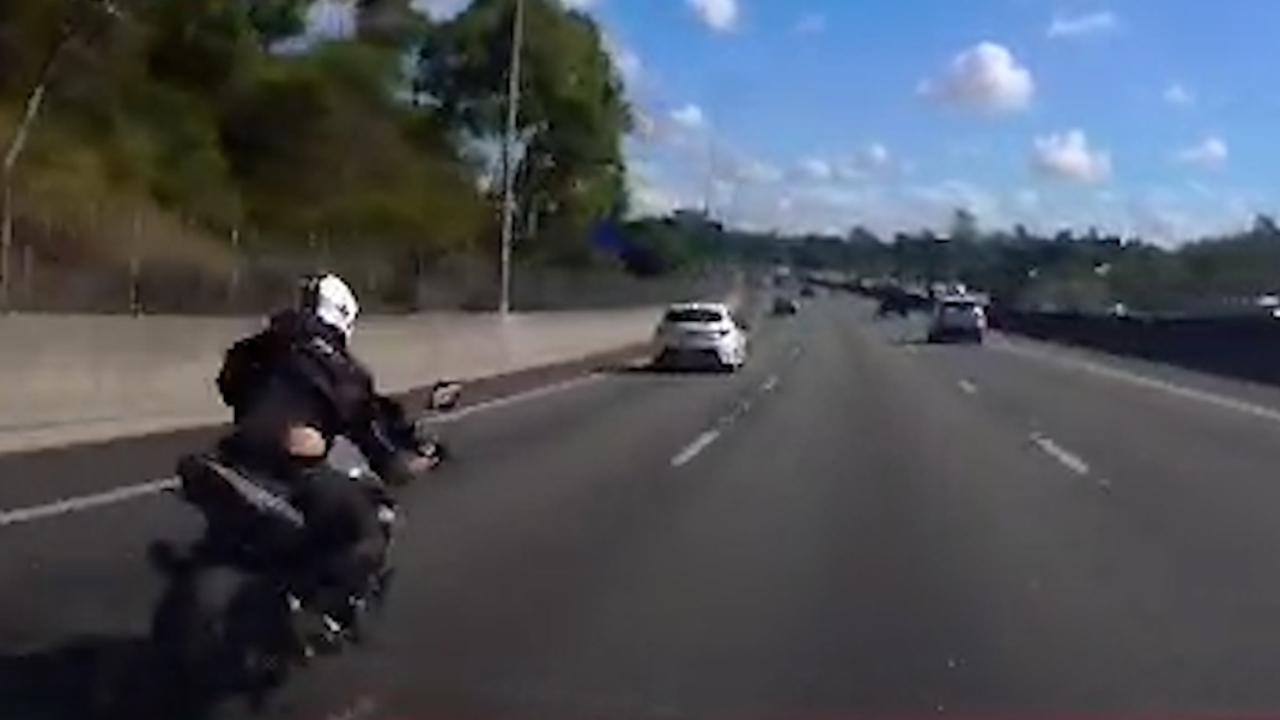 Dashcam footage of a motorbike travelling at high speed on the Warrego Hwy moments before a fatal crash at Haigslea.