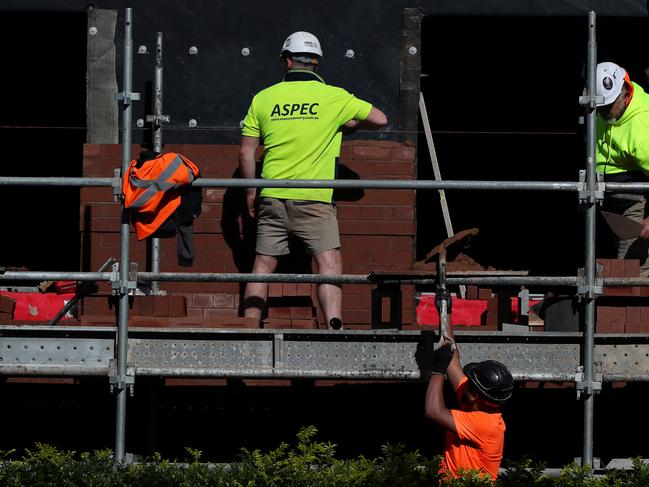 SYDNEY, AUSTRALIA - JUNE 24: Construction workers are seen onsite at a combined residential and commercial development in Surry Hills on June 24, 2024 in Sydney, Australia. Sydney's exorbitant housing costs have earned it the dubious distinction of being the second most expensive city in the world for housing, trailing only Hong Kong, in a recent international survey. With a median house price of $1.6 million as of late 2023, owning a home in Sydney is an unattainable dream for many residents and potential buyers. (Photo by Lisa Maree Williams/Getty Images)