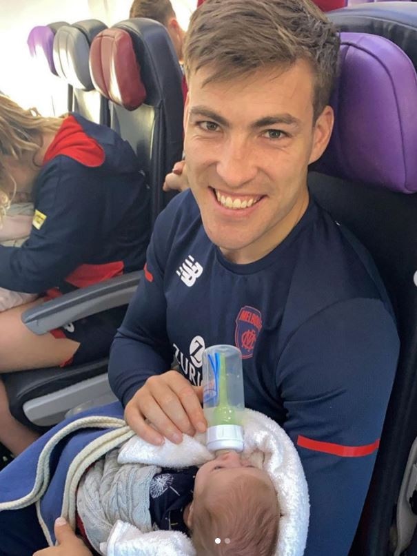 That’s one well-travelled newborn. Viney with baby Mila on the plane as they travelled from Sydney to Queensland. Picture: Instagram