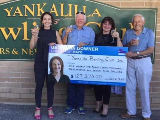 Georgina Downer presents a giant novelty cheque to the Yankalilla Bowling Club in February 2019. She would go on to lose the election in Mayo to Centre Alliance’s Rebekha Sharkie. Picture: Georgina Downer – Liberal for Mayo/Facebook