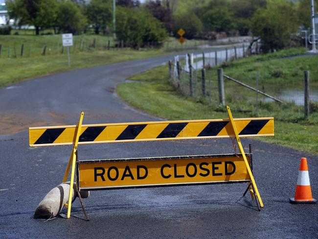 flood damage at Bothwell . Tasmanian Highlands town, picture of the Road closed sign on Logan Road round the back of Bothwell