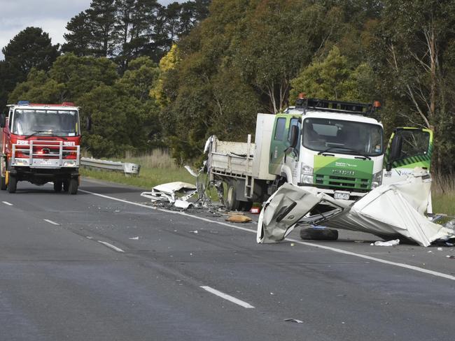 The remains of the van are all but flattened on the road. Picture: Ian Wilson