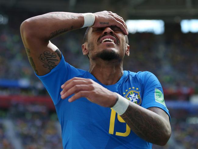 World Cup 2018: Topless Brazil fans in Rio celebrate dramatic late win over  Costa Rica after goals from Philippe Coutinho and Neymar