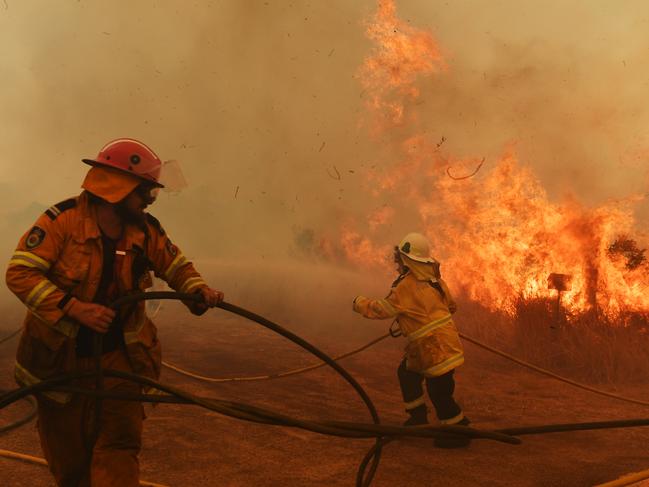 Firefighters battle a spot fire in Hillville. Picture: Sam Mooy/Getty Images