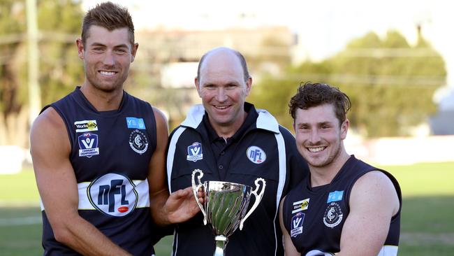 NFL captains Matt Dennis and Jesse Donaldson with coach Garry Ramsay. Picture: Mark Wilson.