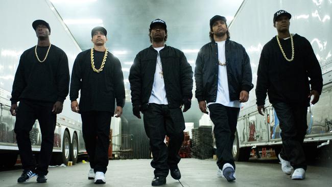 This photo provided by Universal Pictures shows, Aldis Hodge, from left, as MC Ren, Neil Brown, Jr. as DJ Yella, Jason Mitchell as Eazy-E, O’Shea Jackson, Jr. as Ice Cube and Corey Hawkins as Dr. Dre, in the film, “Straight Outta Compton." The movie released in U.S. theaters on Friday, Aug. 14, 2015. (Jaimie Trueblood/Universal Pictures via AP)