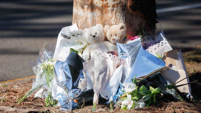 Floral tributes for Xavier and Peter Abreu. Picture: David Swift