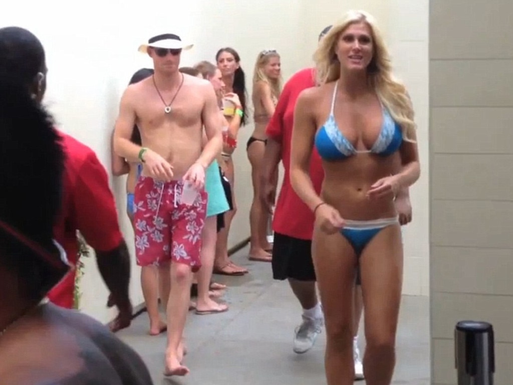 A younger Prince Harry partying with bikini-clad girls in Las Vegas.
