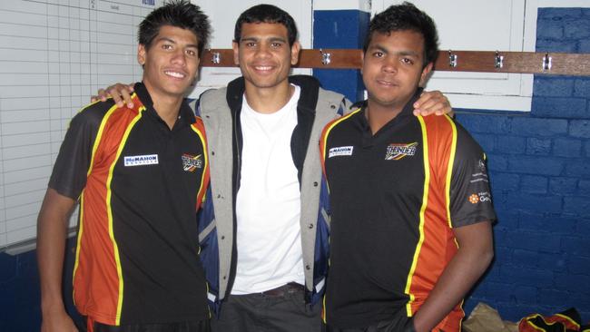 Willie Rioli (right) with cousins Ben (left) and Cyril (middle) at the 2011 Under 18 championships. Picture: Grey Morris