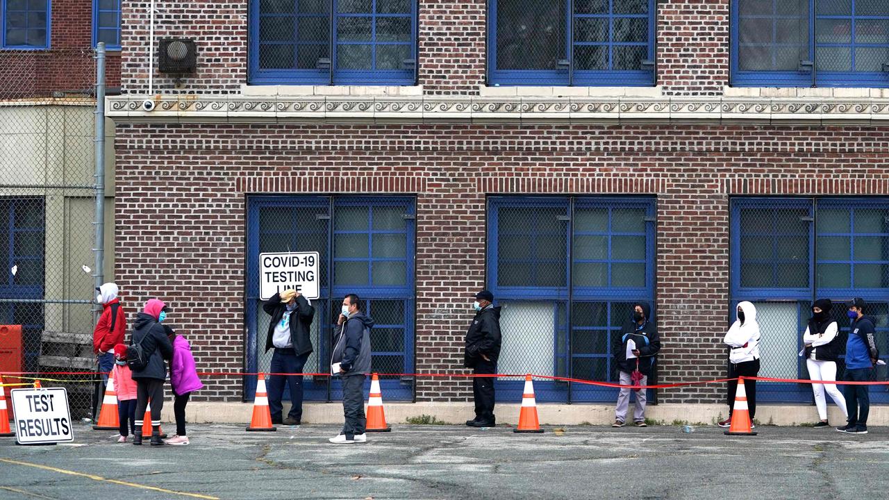 People wait in line to get tested for COVID-19 in New Jersey on November 12. Picture: Timothy A Clary/AFP