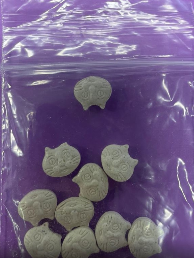 A clear plastic bag full of cat-shaped pills. Picture: Qld Police