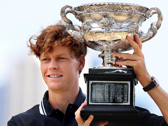 MELBOURNE, AUSTRALIA - JANUARY 27: Jannik Sinner of Italy poses with the Norman Brookes Challenge Cup during the 2025 Australian Open Men's champion media opportunity at Albert Park Lake on January 27, 2025 in Melbourne, Australia. Sinner defeated Alexander Zverev of Germany in last night's Men's Singles Final. (Photo by Kelly Defina/Getty Images)