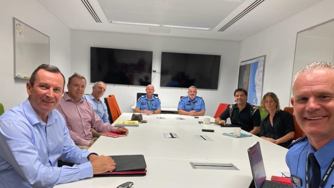 WA Premier Mark McGowan (far left) at a meeting with Carnarvon police on Friday.