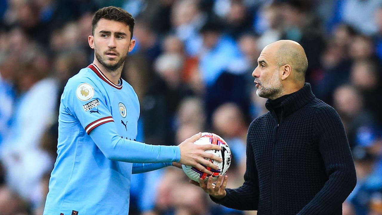 Laporte with Pep Guardiola.