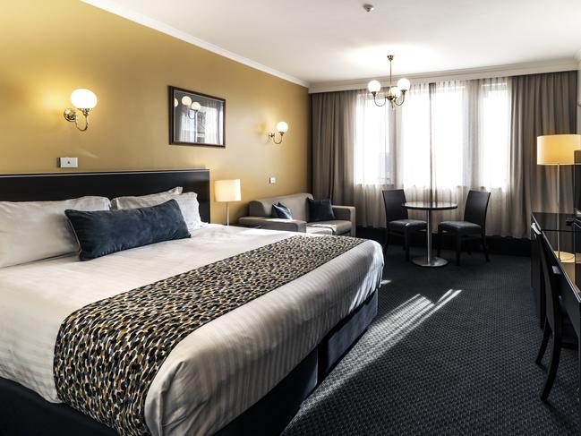 One of the stylish, modern suites featuring generous king-sized beds at the Lenna of Hobart.