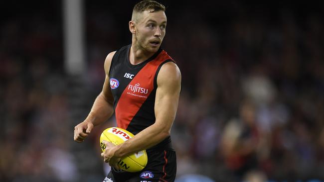 Devon Smith in action for Essendon.