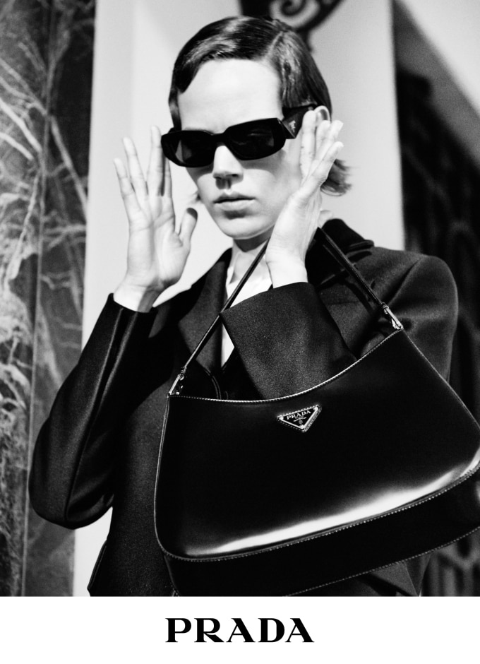 Woman with Black Prada Bag with Golden Logo and White Jacket before  Blumarine Fashion Show, Milan Fashion Editorial Image - Image of elegant,  logo: 194564870