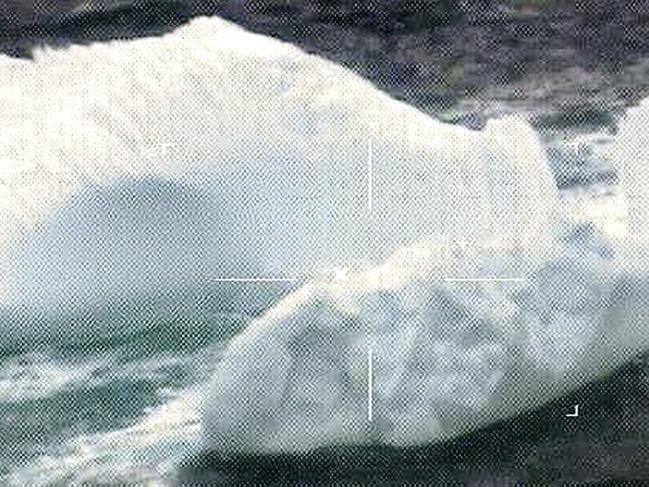 This March 2017 photo released by the U.S. Coast Guard and made by a robotic camera aboard a reconnaissance aircraft, shows icebergs floating near the Grand Banks of Newfoundland in the North Atlantic Ocean. There were about 450 icebergs near the Grand Banks of Newfoundland as of Monday, April 3, 2017, up from 37 a week earlier, according to the Coast Guardâ€™s International Ice Patrol in New London, Conn. The unusually large swarm early in the season is forcing vessels to slow to a crawl or take detours of hundreds of miles. (U.S. Coast Guard via AP)