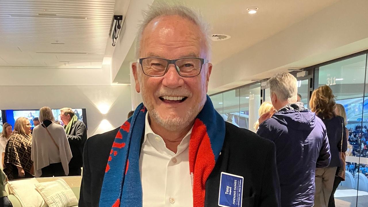 Venues NSW boss Tony Shepherd wearing a Roosters scarf at the opening match at Allianz Stadium.