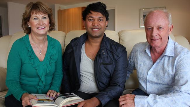 Saroo Brierley with his adoptive parents John and Sue.