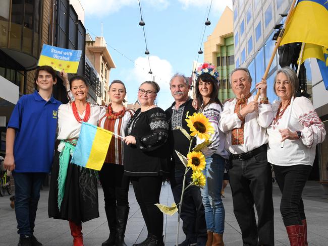 UKRAINE FLASH MOB. (L-r) Lucan Semcesen, Natalie Ermer, Natalya Boujenko, Lecia Semcesen, Bohdan Lesiw, Tamara Jarowyi, Peter Jarowyj and Christine Jarowyi pictured in Rundle Mall on the 13th August, 2022. Picture: Tricia Watkinson