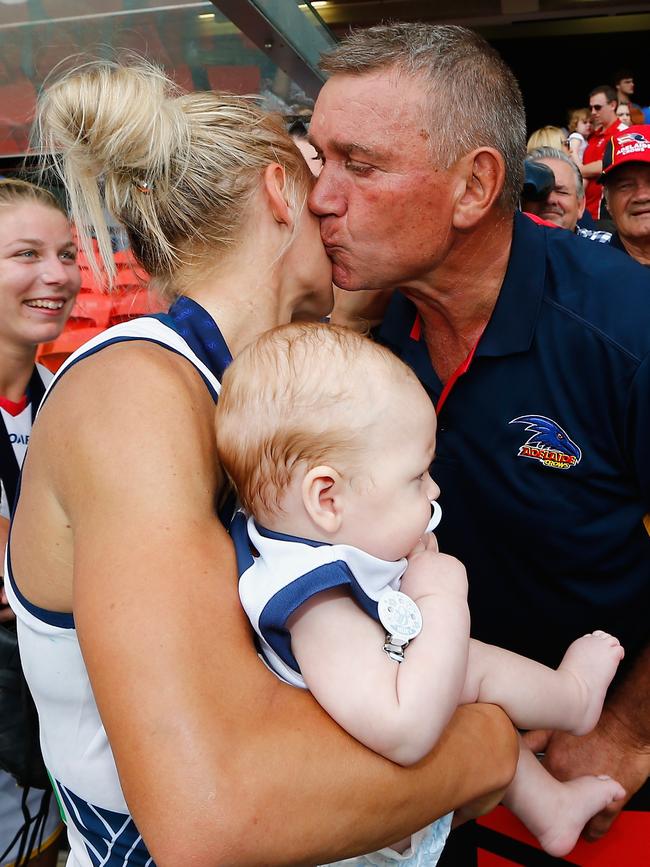 Crows AFLW star Erin Phillips (L) celebrates with her dad Greg after the 2017 grand final win against Brisbane. Picture: Jason O’Brien/Getty Images