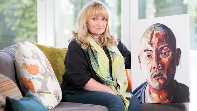 Bali Nine Pastor Christie Buckingham with a painting of Andrew Chan by Myuran Sukumaran. Picture: Sarah Matray