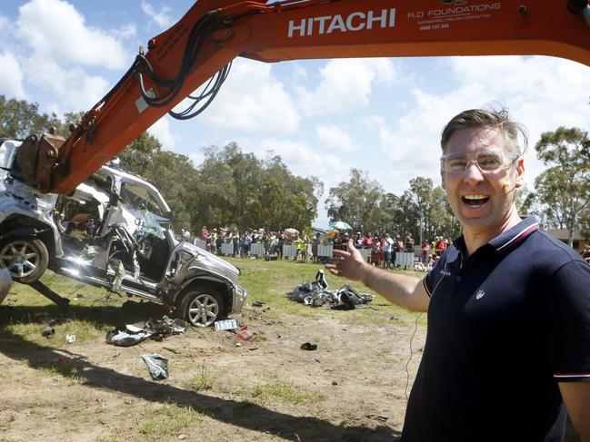 Ashton Wood gets help to destroy his Jeep that was a lemon from the moment he drove it out of the dealer ship. Bli Bli. Pic Megan Slade