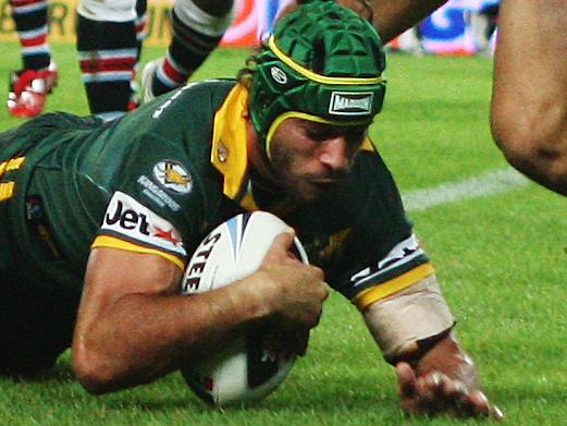 Australian Kangaroos v Fiji 2008 Rugby League World Cup semi-final at the Sydney Football Stadium. Australia's Johnathan Thurston scores a try.