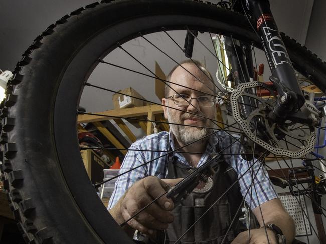 Steve Connor with a bike out the front of his shop Myrtleford Cycle Centre. Picture: Tony Gough