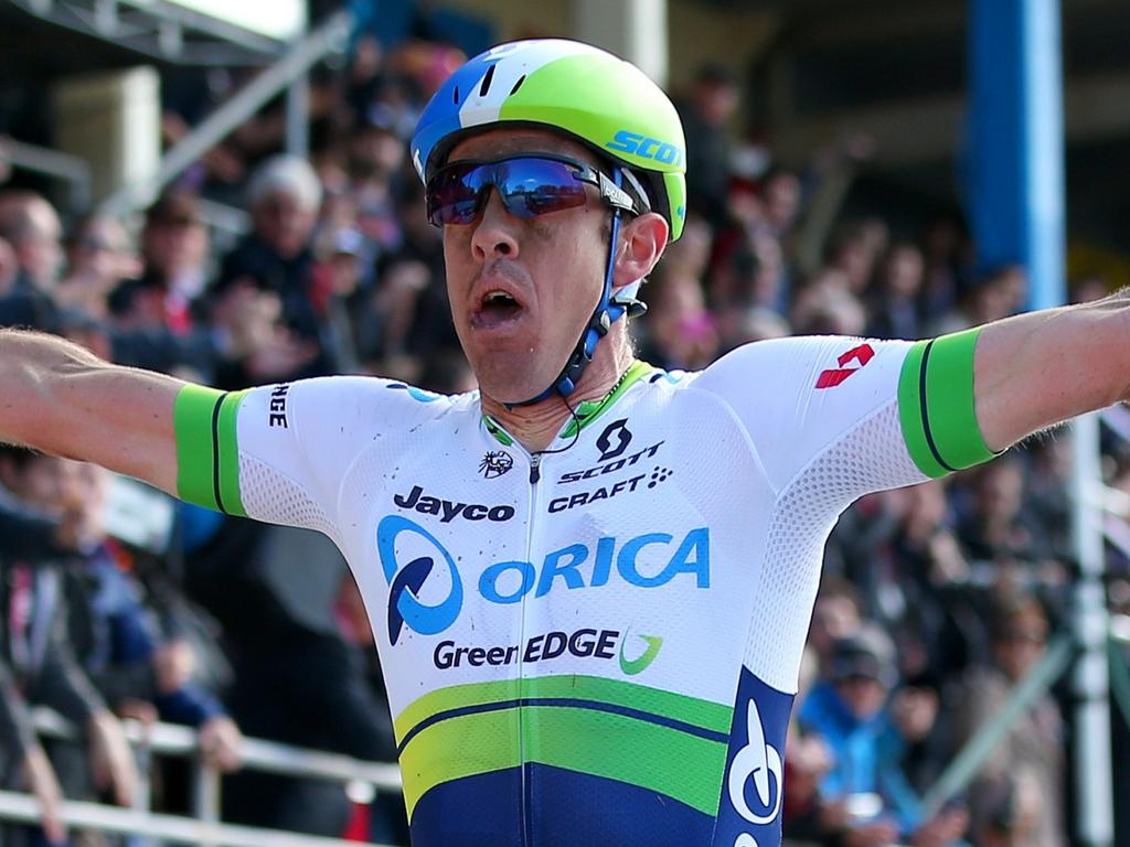 ROUBAIX, FRANCE - APRIL 10:  Mathew Hayman of Australia and Orica-GreenEdge crosses the finish line ahead of Tom Boonen of Belgium and Etixx - Quick-Step to win the 2016 Paris - Roubaix cycle race from Compiegne to Roubaix on April 10, 2016 in Roubaix, France.  (Photo by Bryn Lennon/Getty Images)