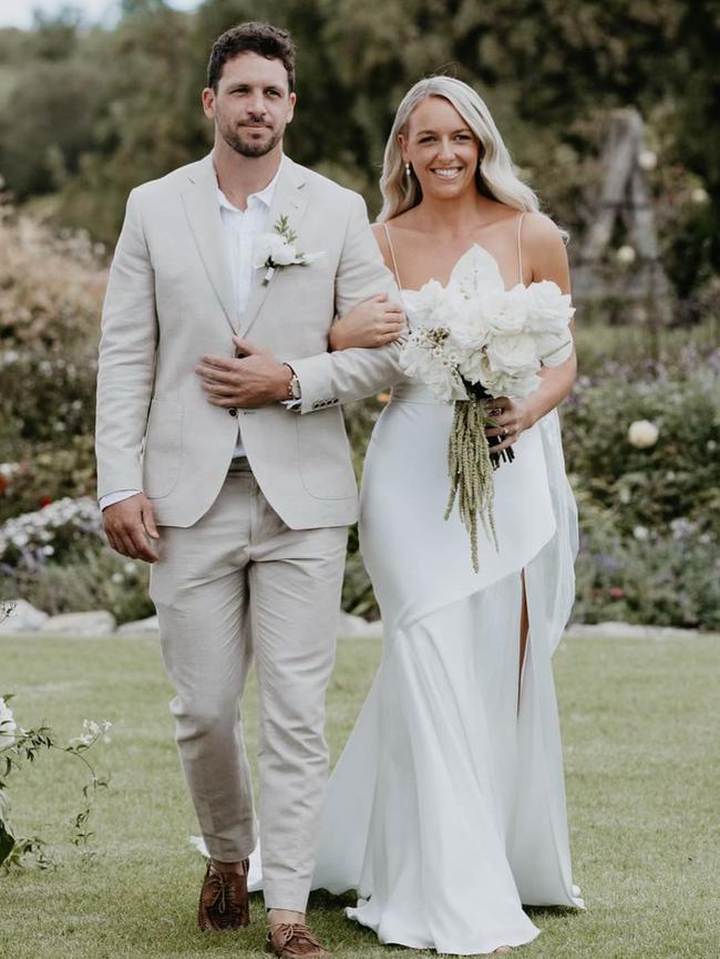 Port Adelaide player Travis Boak walking his sister, Cassie Boak, down the aisle after their Dad died of cancer 18 years ago. Picture: Captured by Georgie