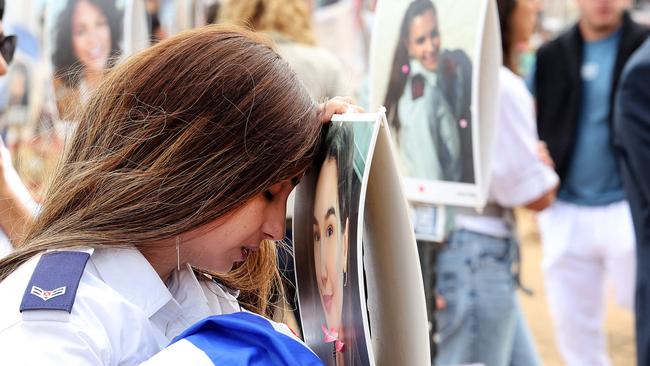 A visitor mourns at a memorial for people who were taken hostage or killed in the Hamas attack on the Supernova music festival on October 7, at the site of the festival near Kibbutz Reim in southern Israel on May 13, 2024. Picture: AFP