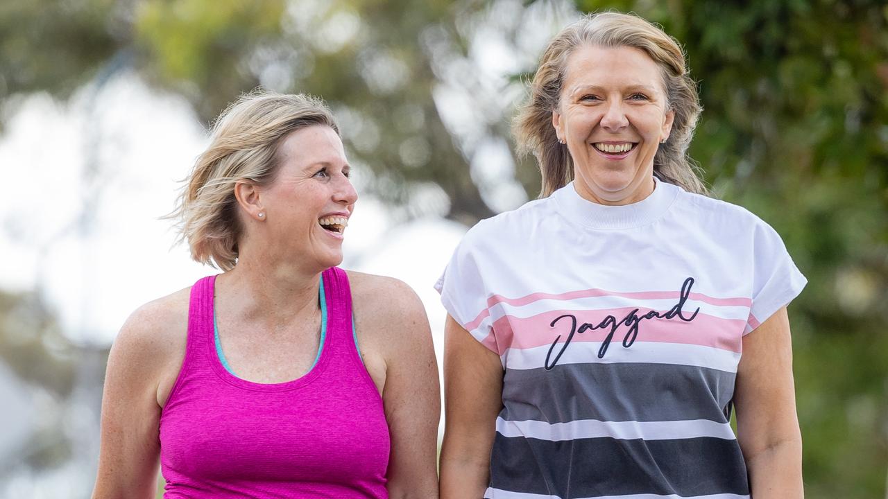 Cathy Lewis and Sally Luscombe walk together along the Maribyrnong River most weeks to try and keep the menopausal monster of weight gain at bay. Picture: Jason Edwards