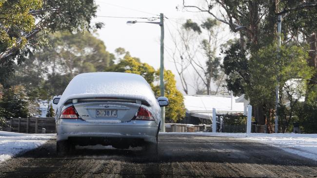 low visibility from the rear window of this car driving on Olinda Grove, Mount Nelson